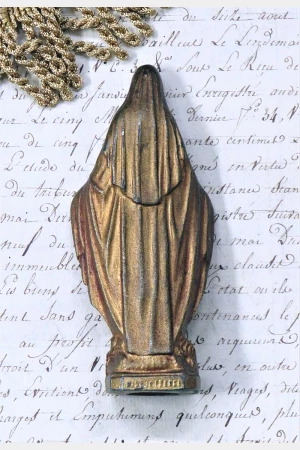 Oud metalen beeldje O.L.V.