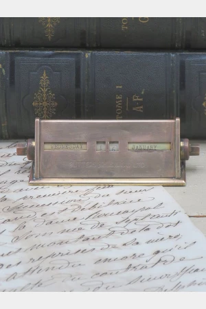 Antieke Engelse messing bureaukalender ” Butters Brothers & ‘Co Ltd”