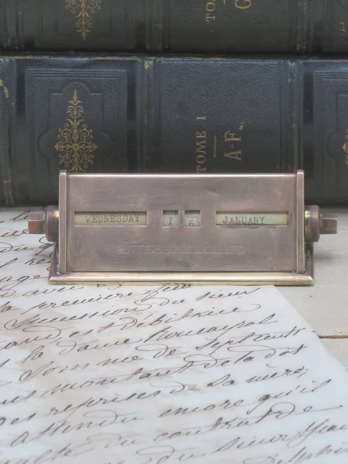 Antieke Engelse messing bureaukalender ” Butters Brothers & ‘Co Ltd”