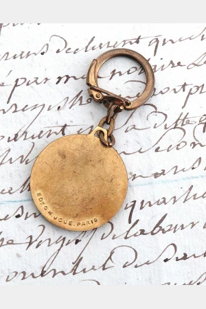 Oude Franse vintage sleutelhanger "Biscuits Olibet"