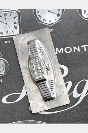 Oude chocoladevorm "Horloge"
