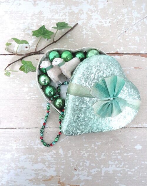 Oude candycontainer "Hart"