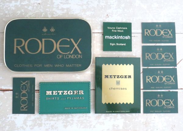 9 Vintage reclamebordjes "Clothes for men"