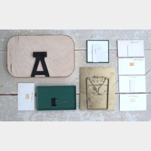 9 Vintage reclamebordjes "Clothes for men"