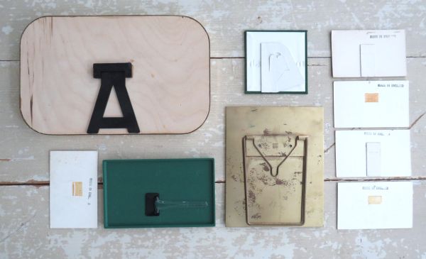 9 Vintage reclamebordjes "Clothes for men"