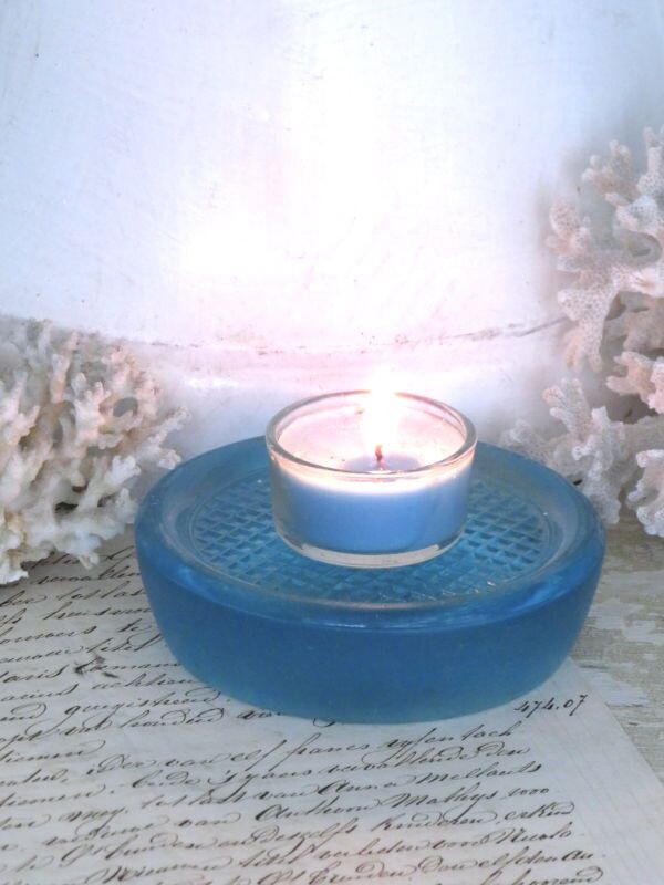 Oude turquoise persglazen verhoger.